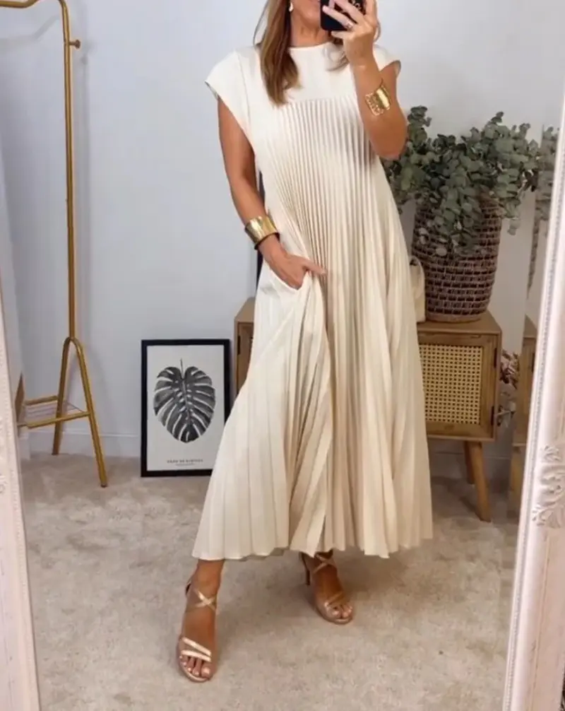 Carlena | Elegancka plisowana sukienka midi z kieszeniami