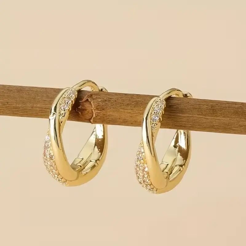 Curving Interlock Earrings with Diamonds