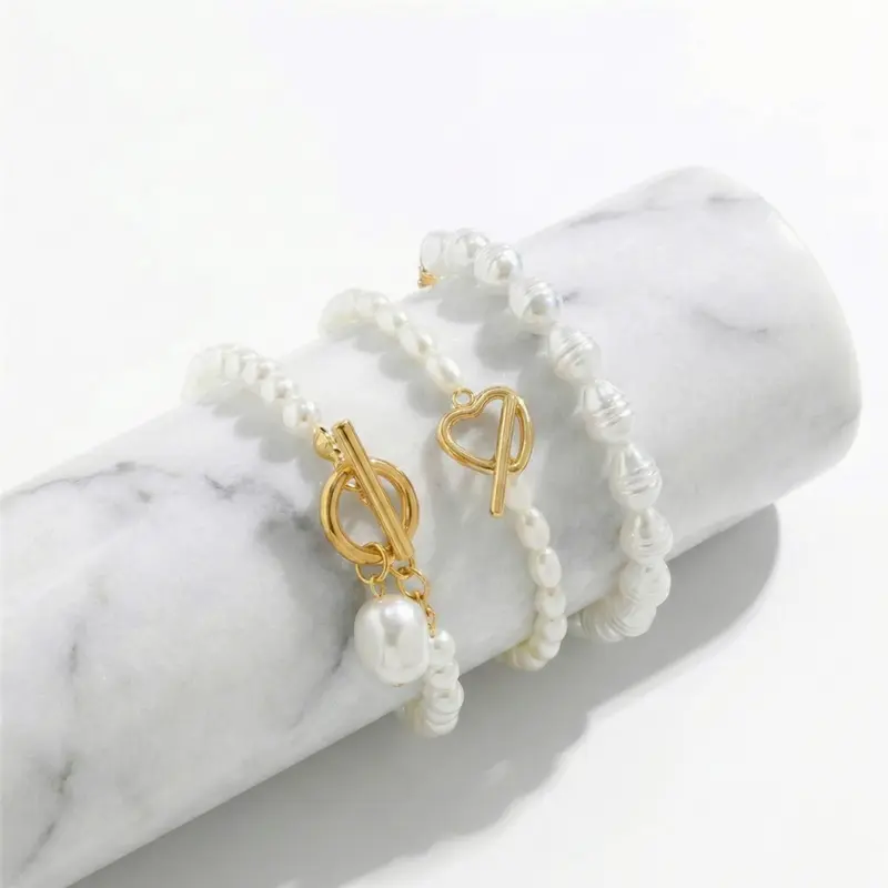 Damen Perlenarmband mit Knebelverschluss und Anhänger | Shop Nory