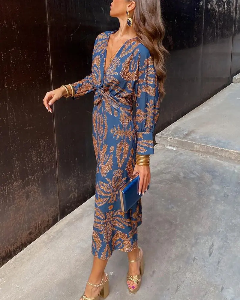 Dineke - Elegant dress with long sleeves and floral print