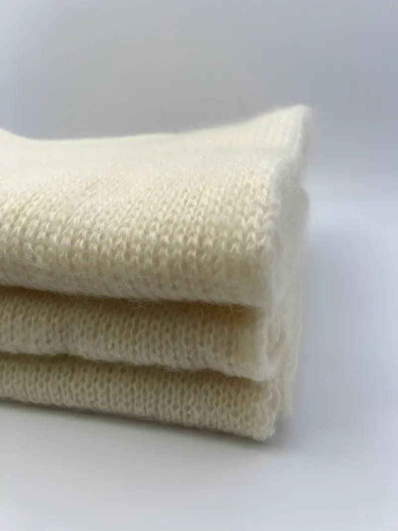 Gebreide wollen sjaal in off white/crème