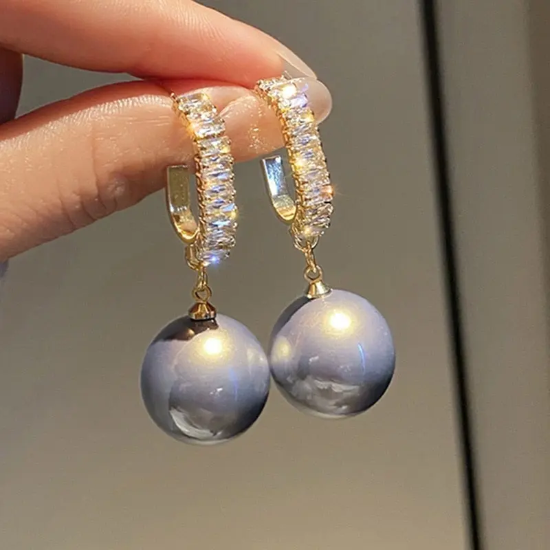 Luxuriöse Ohrringe mit Perlen und Zirkonia – Amara | Shop Nory