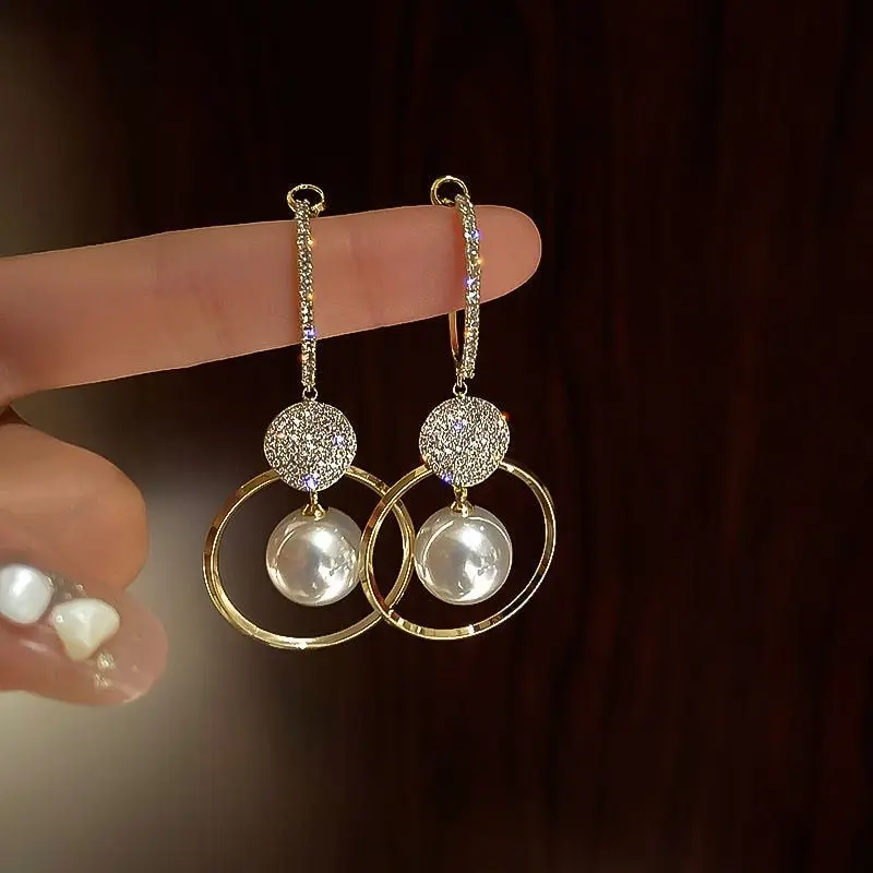Luxuriöse Ohrringe mit Silber und Perle - Isadora | Shop Nory