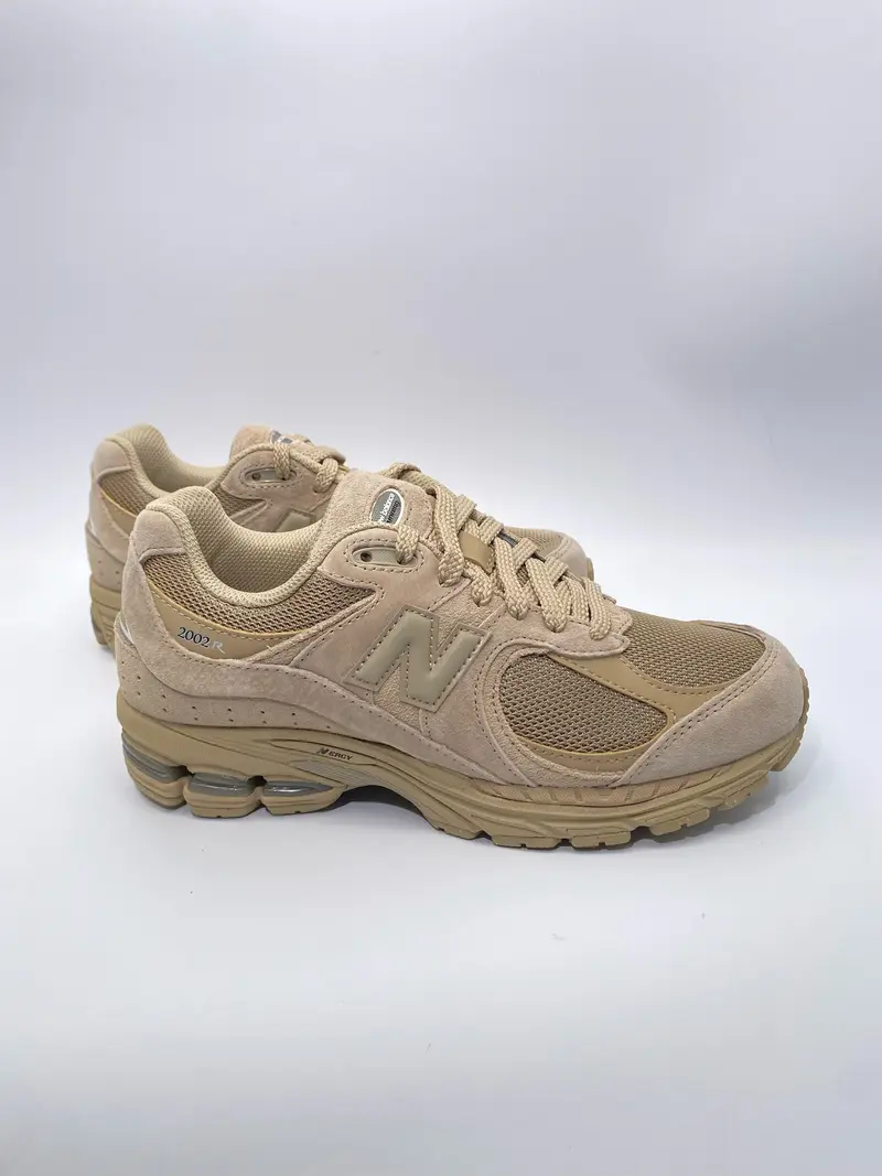 New Balance U2002519 Stoneware met silver metallic