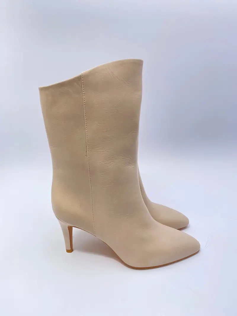 The Seller off white boots - higher heel