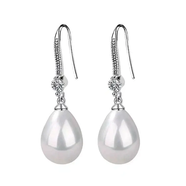 Weiße ovale Perlenohrringe | Shop Nory